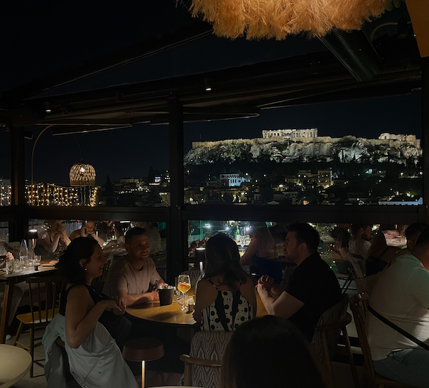 rooftop bar with view of acropolis