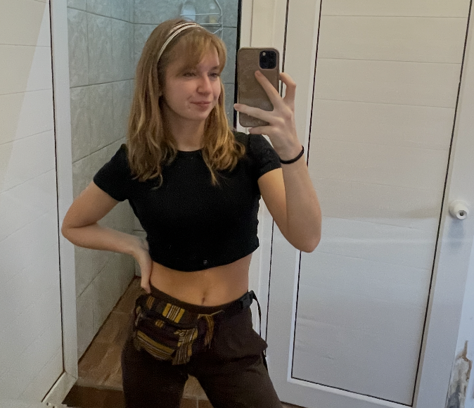 Girl taking mirror selfie