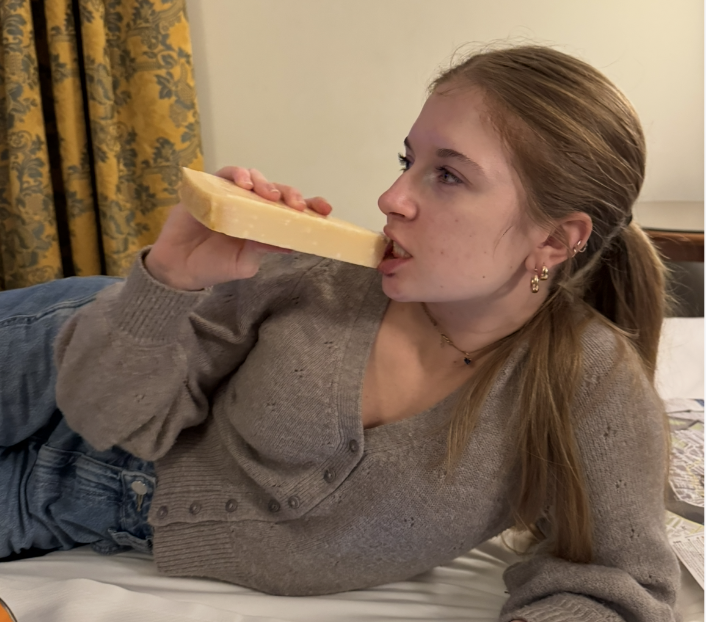 Girl eating cheese in Florence